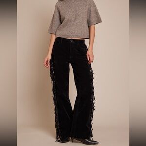 Black faux suede fringe pants